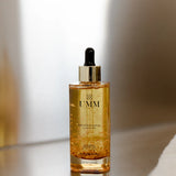 The Golden Ritual Oil by UMM Skincare, a 24K gold pre-shower body oil inspired by Abhyanga, the Ayurvedic warm-oil ritual