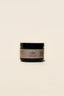 UMM Skincare Body Scrub packaging in a black jar with tan brand logo.