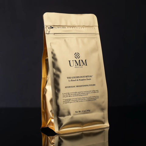 The Golden Dust Ritual by UMM Skincare, a gold-flecked botanical body polish inspired by Ayurvedic Udvartana